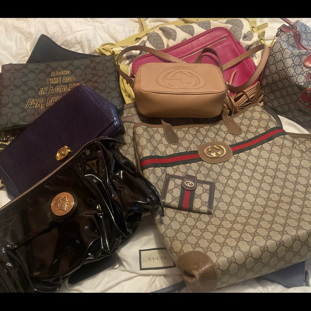 Gucci! A bit of my personal collection, including some Coach. I LOVE Handbags!